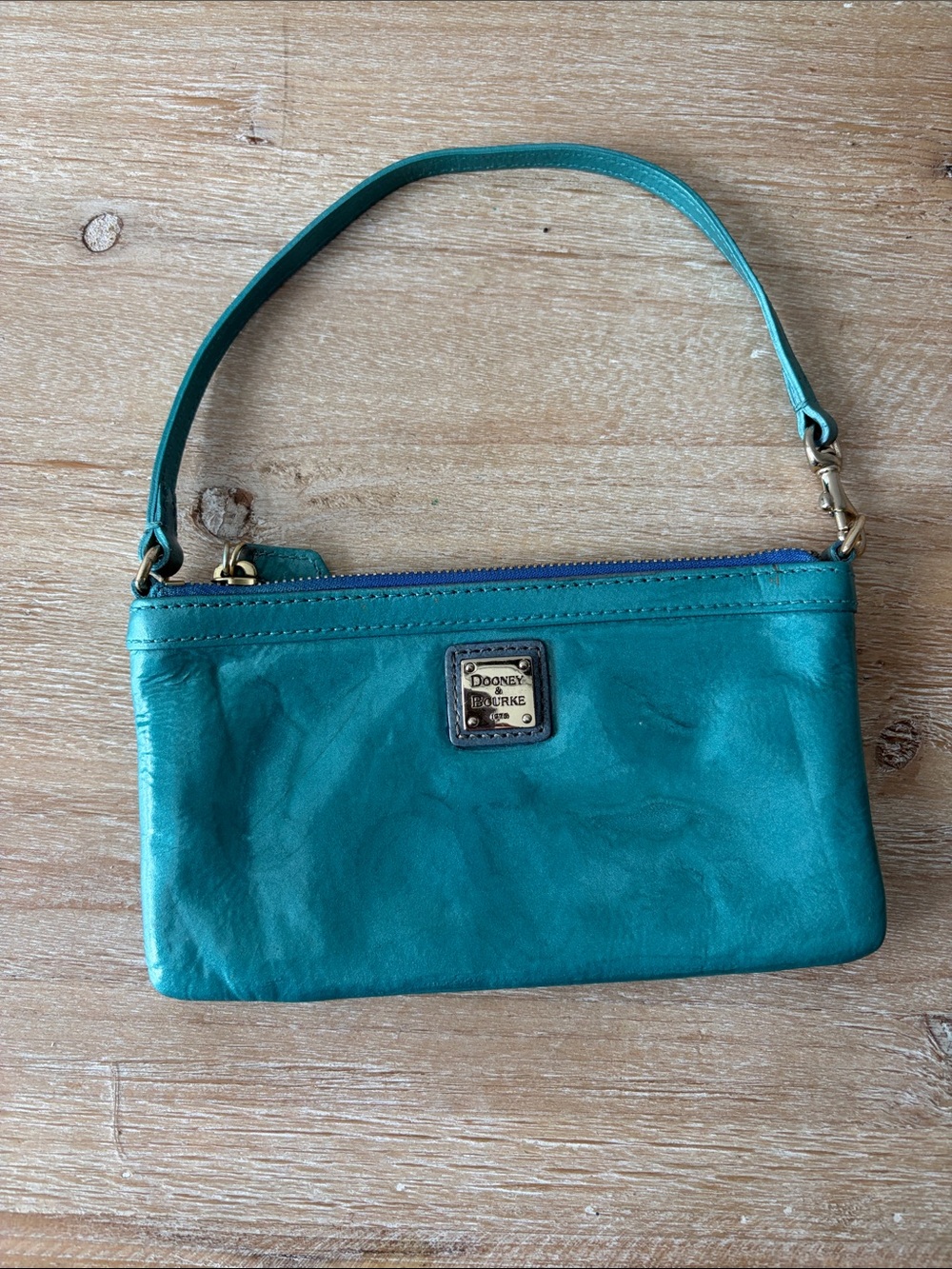 Dooney & Bourke Turquoise Leather Wristlet with Silver Logo Plaque